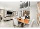 Spacious living area with an open layout, seamlessly connecting the dining room, living room, and kitchen at 711 Florence Isle Ave, Henderson, NV 89015