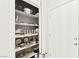 Well-organized pantry with shelving, perfect for storing kitchen essentials and supplies at 711 Florence Isle Ave, Henderson, NV 89015
