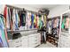 Well-organized walk-in closet with shelving, hanging space, and ample storage at 711 Florence Isle Ave, Henderson, NV 89015