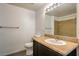 Bathroom featuring a single sink with mirror, vanity and tan countertop at 8000 Badura Ave # 1168, Las Vegas, NV 89113