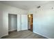 Bedroom features wood-look flooring, closet, and lighting at 8000 Badura Ave # 1168, Las Vegas, NV 89113