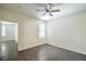 Bedroom featuring wood-look flooring, ceiling fan with light, neutral walls, and a window at 8000 Badura Ave # 1168, Las Vegas, NV 89113