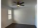 Bright bedroom features a ceiling fan and laminate flooring at 8000 Badura Ave # 1168, Las Vegas, NV 89113