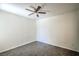 Neutral bedroom features wood floors, a ceiling fan, and white trim at 8000 Badura Ave # 1168, Las Vegas, NV 89113