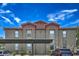Exterior shot of the condo, showcasing the well-kept building, and dedicated parking spaces at 8000 Badura Ave # 1168, Las Vegas, NV 89113