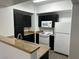 An efficient kitchen design with ample countertop space and modern appliances at 8000 Badura Ave # 1168, Las Vegas, NV 89113