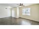 Inviting living room with wood floors, ceiling fan, and bright window at 8000 Badura Ave # 1168, Las Vegas, NV 89113