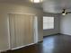 Living area boasts sliding glass door access to the balcony and a large window at 8000 Badura Ave # 1168, Las Vegas, NV 89113