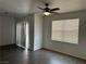 Living room featuring wood-look flooring, blinds and a ceiling fan at 8000 Badura Ave # 1168, Las Vegas, NV 89113