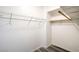 Walk-in closet features white walls, wood-style floors and wire shelving at 8000 Badura Ave # 1168, Las Vegas, NV 89113