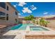 Inviting backyard featuring a sparkling swimming pool and spa, perfect for outdoor relaxation at 8244 Cupertino Heights Way, Las Vegas, NV 89178
