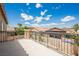 Balcony with a black metal railing overlooking the neighborhood at 8244 Cupertino Heights Way, Las Vegas, NV 89178