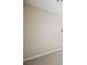 Neutral bedroom wall with white trim and carpet flooring, showing simple outlets at 8244 Cupertino Heights Way, Las Vegas, NV 89178