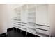 Walk-in closet with custom shelving, drawers, and ample storage space at 8244 Cupertino Heights Way, Las Vegas, NV 89178