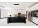 Spacious kitchen with a large island, stainless steel appliances, and modern lighting at 8244 Cupertino Heights Way, Las Vegas, NV 89178