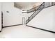 Spacious foyer with high ceilings, modern lighting, and a staircase leading to the upper level at 8244 Cupertino Heights Way, Las Vegas, NV 89178