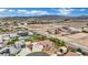 Expansive desert property with custom home, red tile roof, desert landscaping, mountain views, and outlined lot lines at 9180 Mohawk St, Las Vegas, NV 89139