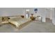 Spacious bedroom featuring unique gold-toned furnishings and an attached bathroom with elegant fixtures at 9180 Mohawk St, Las Vegas, NV 89139