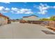 Expansive driveway and gated entrance enhances curb appeal and provides ample parking space at 9180 Mohawk St, Las Vegas, NV 89139