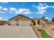 Charming single-story home featuring a spacious driveway and desert landscaping for low maintenance at 9180 Mohawk St, Las Vegas, NV 89139