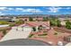 Charming home featuring three-car garage, well-manicured landscaping with unique mini-golf course in the front yard at 9180 Mohawk St, Las Vegas, NV 89139