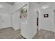 Convenient laundry room with washer, storage shelves, and tile flooring at 9180 Mohawk St, Las Vegas, NV 89139