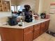 Extended countertop with cabinets, appliances, and accessories in a bright kitchen area at 9611 Sky Hollow Dr, Las Vegas, NV 89123