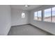 Bedroom with carpet floors, white walls and good natural light at 9855 Ashton Pines Ct, Las Vegas, NV 89147