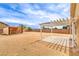 Backyard features gravel cover, a pergola and a privacy fence at , Pahrump, NV 89061