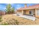 The backyard has gravel cover, a covered patio, and a privacy fence at , Pahrump, NV 89061