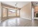 Open dining area with a decorative chandelier, large windows and access to a fireplace at , Pahrump, NV 89061