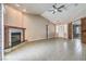 Spacious living room featuring vaulted ceilings, fireplace, neutral colors, and ample natural light at , Pahrump, NV 89061