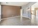 Bright living room boasts tile floors, and an open floor plan with multiple entryways at , Pahrump, NV 89061