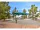 Neighborhood picnic area with shaded tables, barbecue grill, and well-kept landscaping at , Pahrump, NV 89061