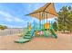 Community playground with colorful play structure, sunshade, slides, and climbing equipment for children at , Pahrump, NV 89061
