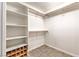 Well-organized walk-in closet with custom shelving, and hanging space with tile flooring at , Pahrump, NV 89061