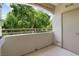 Cozy balcony with large green trees in the background at 10211 Red Pueblo Pl # 203, Las Vegas, NV 89144