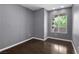 This bedroom features neutral walls and a bright window at 10211 Red Pueblo Pl # 203, Las Vegas, NV 89144