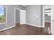 Clean, carpetless bedroom featuring hardwood floors and a closet at 10211 Red Pueblo Pl # 203, Las Vegas, NV 89144