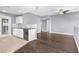 Open floor plan with the kitchen flowing into the living room and access to an outdoor patio at 10211 Red Pueblo Pl # 203, Las Vegas, NV 89144