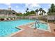 Community pool with spa and pool rules at 10211 Red Pueblo Pl # 203, Las Vegas, NV 89144