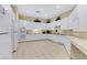 Spacious white kitchen with modern appliances and ample cabinet space at 10372 Timber Canyon Ave, Las Vegas, NV 89129