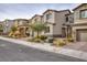 Charming two-story home with landscaped yard, and neutral colored stucco exterior at 10376 Sadie Blake Ave, Las Vegas, NV 89166