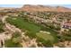 Golf course aerial view, highlighting the community's lush green landscape and mountain backdrop at 11453 Glowing Sunset Ln, Las Vegas, NV 89135