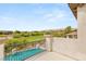 Balcony overlooking pool, golf course and desert landscape at 11453 Glowing Sunset Ln, Las Vegas, NV 89135