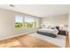 Bedroom boasts ample natural light and a beautiful view overlooking a golf course at 11453 Glowing Sunset Ln, Las Vegas, NV 89135
