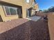 Spacious backyard with desert landscaping, fire pit and patio at 117 Logan Pond Way, North Las Vegas, NV 89084