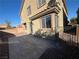 Private backyard with concrete patio and view of neighborhood at 117 Logan Pond Way, North Las Vegas, NV 89084
