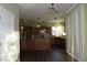 Open concept kitchen with stainless appliances, island and wood cabinets at 117 Logan Pond Way, North Las Vegas, NV 89084
