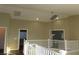 Second-floor landing featuring high ceilings and recessed lights at 117 Logan Pond Way, North Las Vegas, NV 89084
